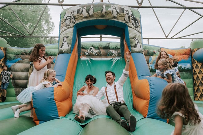 Image of charlotte & mark bouncy castle web res landscape 1920x1080